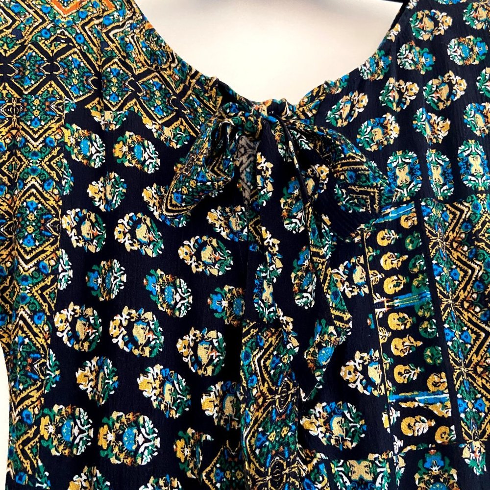 Multi-Patterned Romper With Back Bow - image 6